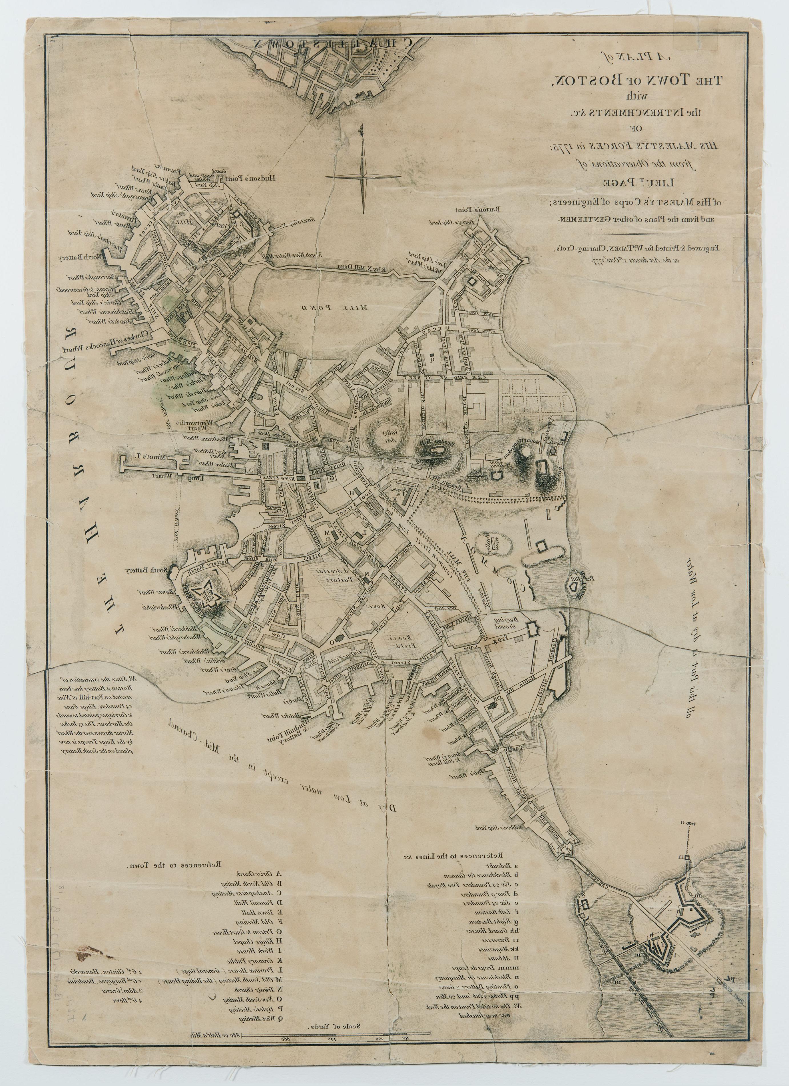 map of boston harbor depicted in black ink with streets 和 wharves labeled; around the harbor text reads "dry at low water"